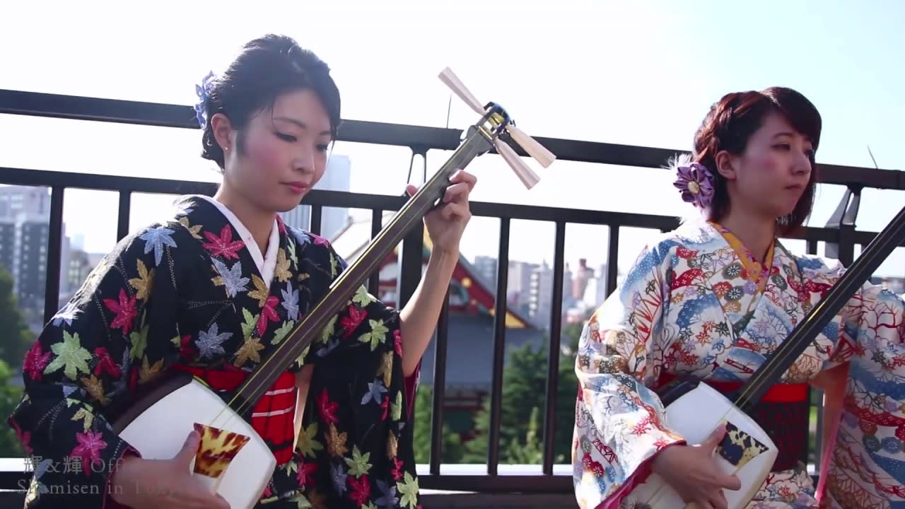 Two Japanese girls absolutely shredding on their Shamisen.