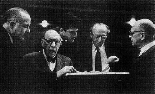 Barber, Stravinsky, Foss, Copland, and Sessions reviewing the score of Les Noces. They organized an English recording of it, with Stravinsky conducting and the others at the four pianos.