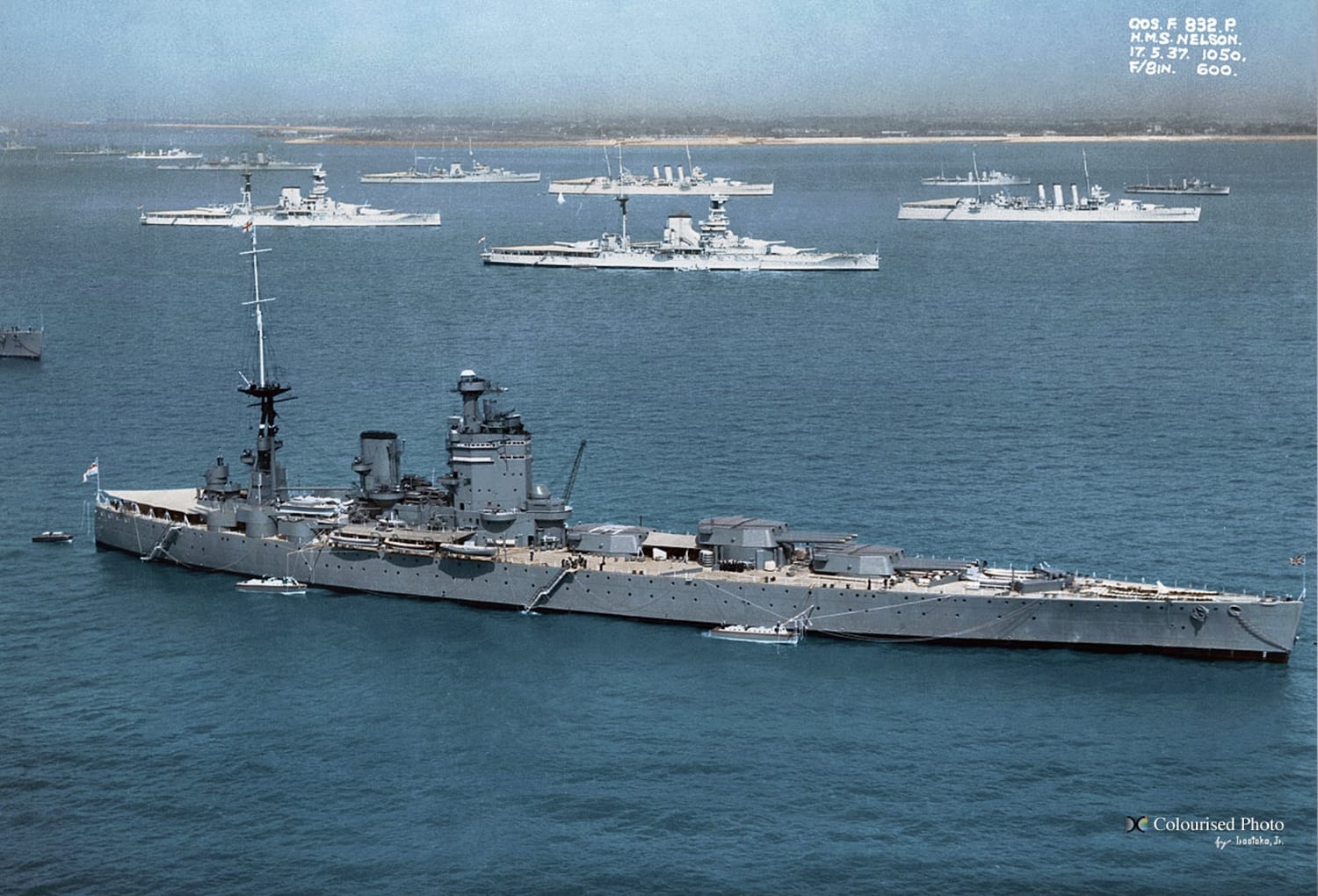 HMS Nelson off of Spithead for the Fleet Review in 1937 - anchored in the background are two Queen Elizabeth class battleships and two London Class Cruisers - colorized by Irootoko Jr.