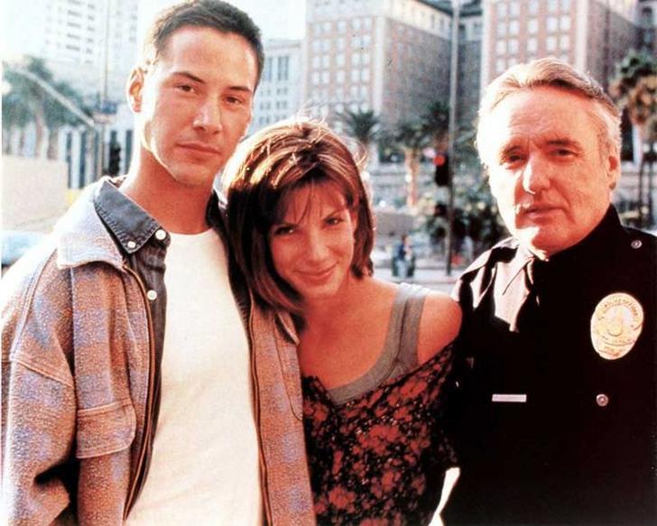 Keanu Reeves, Sandra Bullock, and Dennis Hopper on the set of “Speed”, 1993