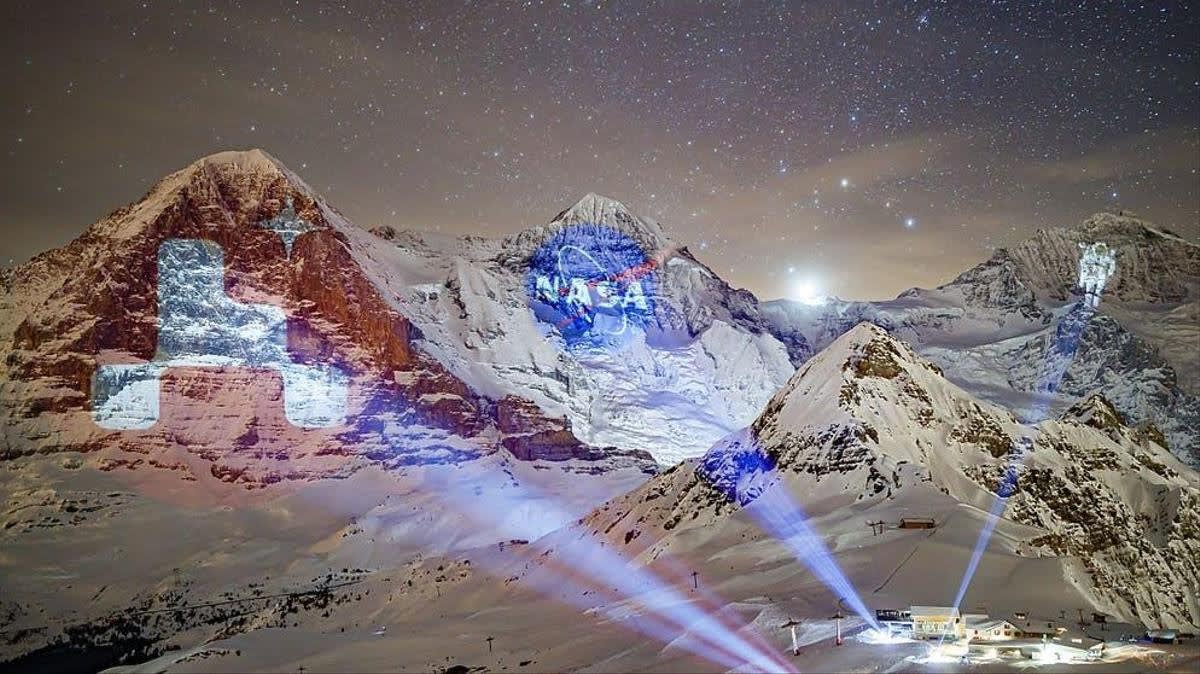 Switzerland celebrates the mars landing by projecting NASA images onto mountain range