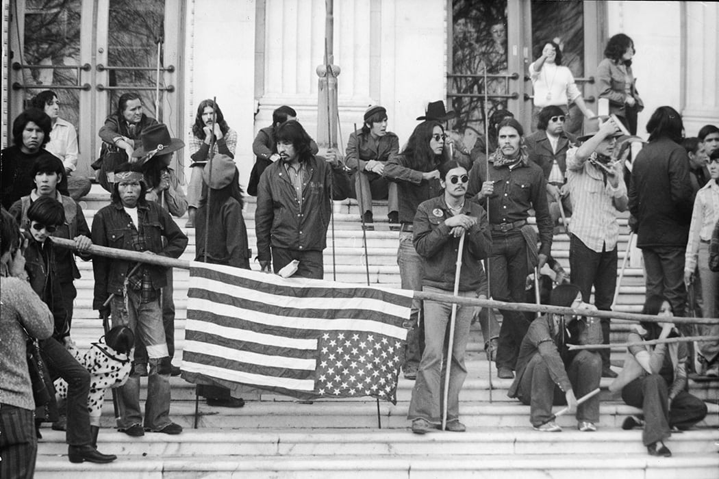 A large group of Native Americans stage a protest over land rights by occupying the Bureau of Indian Affairs building and steps in front, Washington DC, November 6, 1972.