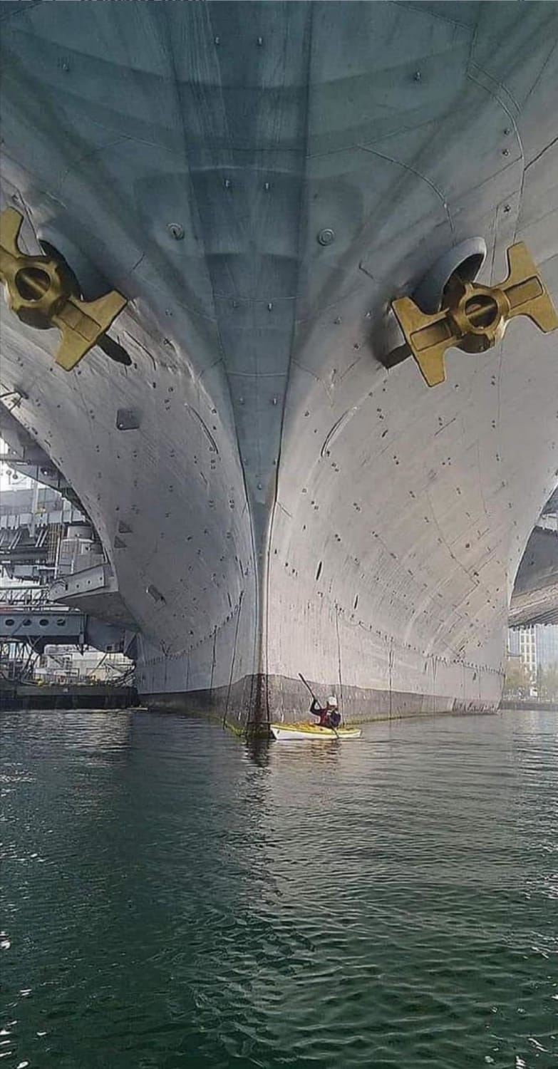 This kayak at the bow of an aircraft carrier
