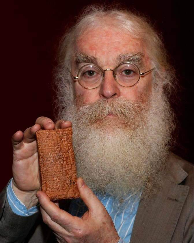 Dr. Irving Finkel holding a 3370 year old tablet telling the story of the god Enki telling the Sumerian king Atram-Hasis (Noah, according to the bible) how to build an ark. The ark is described as a round 220 foot diameter coracle.