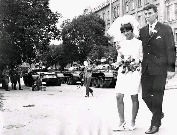Soviet tanks interrupt young couple wedding. Soviet invasion to Czechoslovakia, 1968