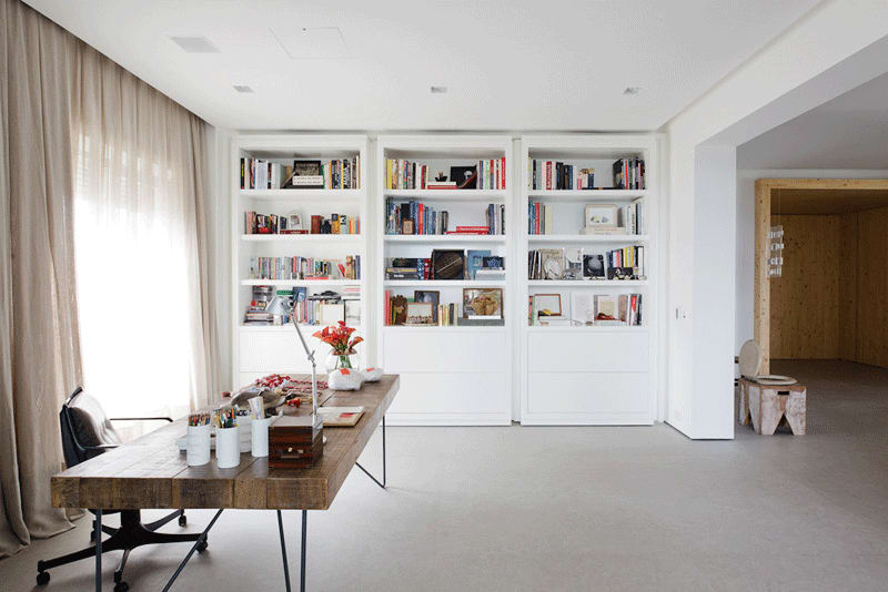 Modern Bookcases Cleverly Revolve to Reveal a Secret Room