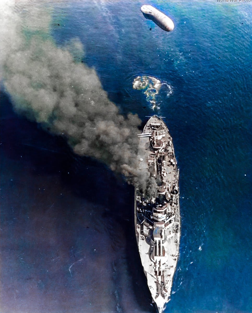 High-quality aerial view of American battleship USS Arkansas (BB-33) underway off the coast of Valparaiso, Chile. [Self-colorization]