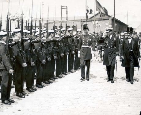 Albert, Duke of York reviewing French Marines during a visit to Caen.