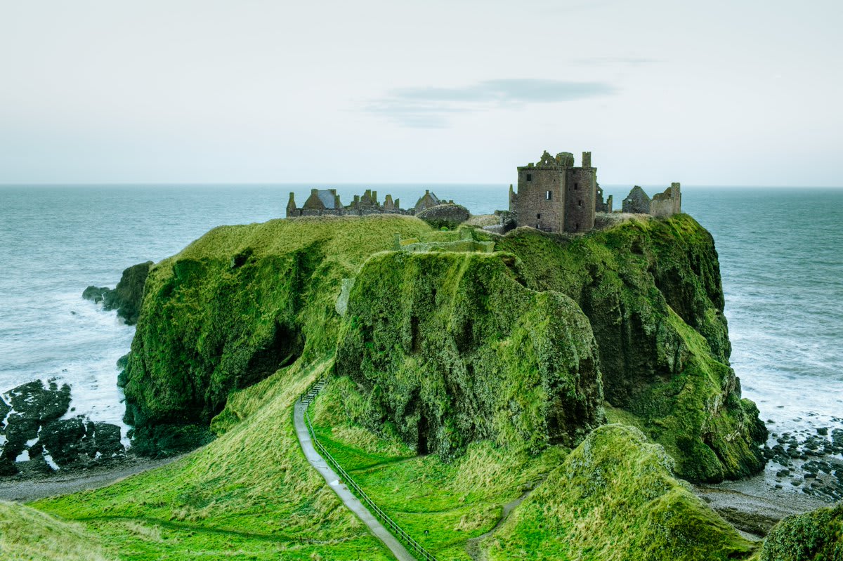 Built for royalty. The Dunnottar Castle is a ruined medieval fortress located upon a rocky headland on the northeastern coast of Scotland. It's known to be a romantic, evocative, and historically significant place of affairs. : Silvia Otte