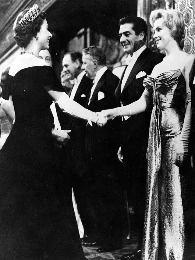 Marilyn Monroe and Queen Elizabeth (both 30 at the time) meet at a movie premiere in London, 1956. ]