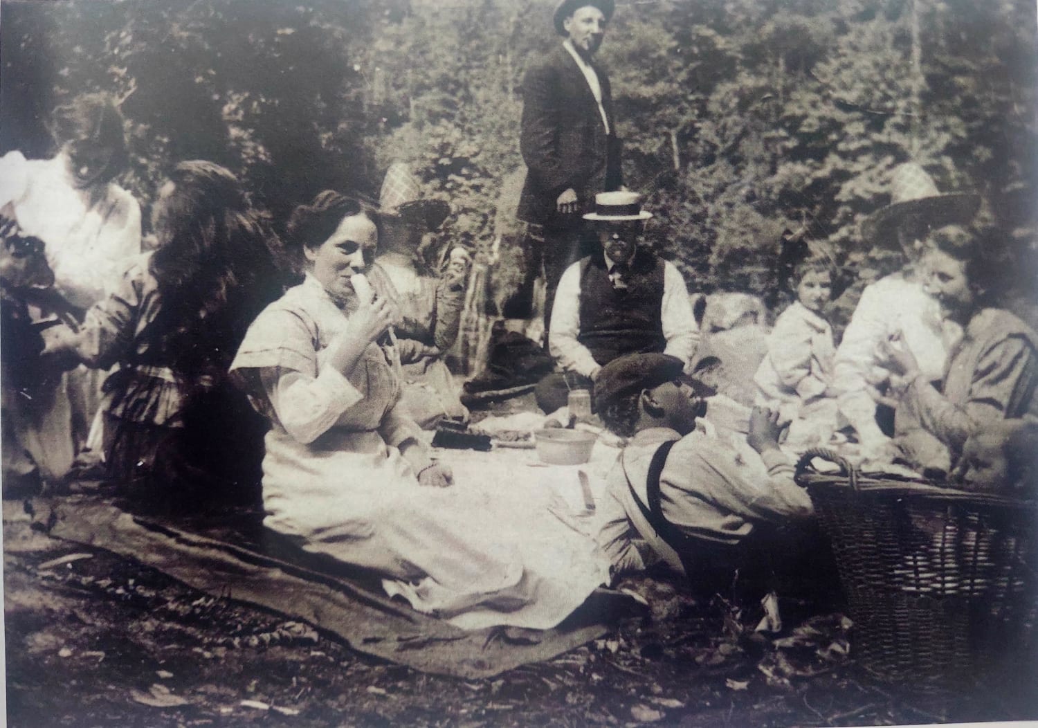 "Picnic at Green River, WA; 1909" that's our great-grandmother in the basket at bottom right. From family archives.