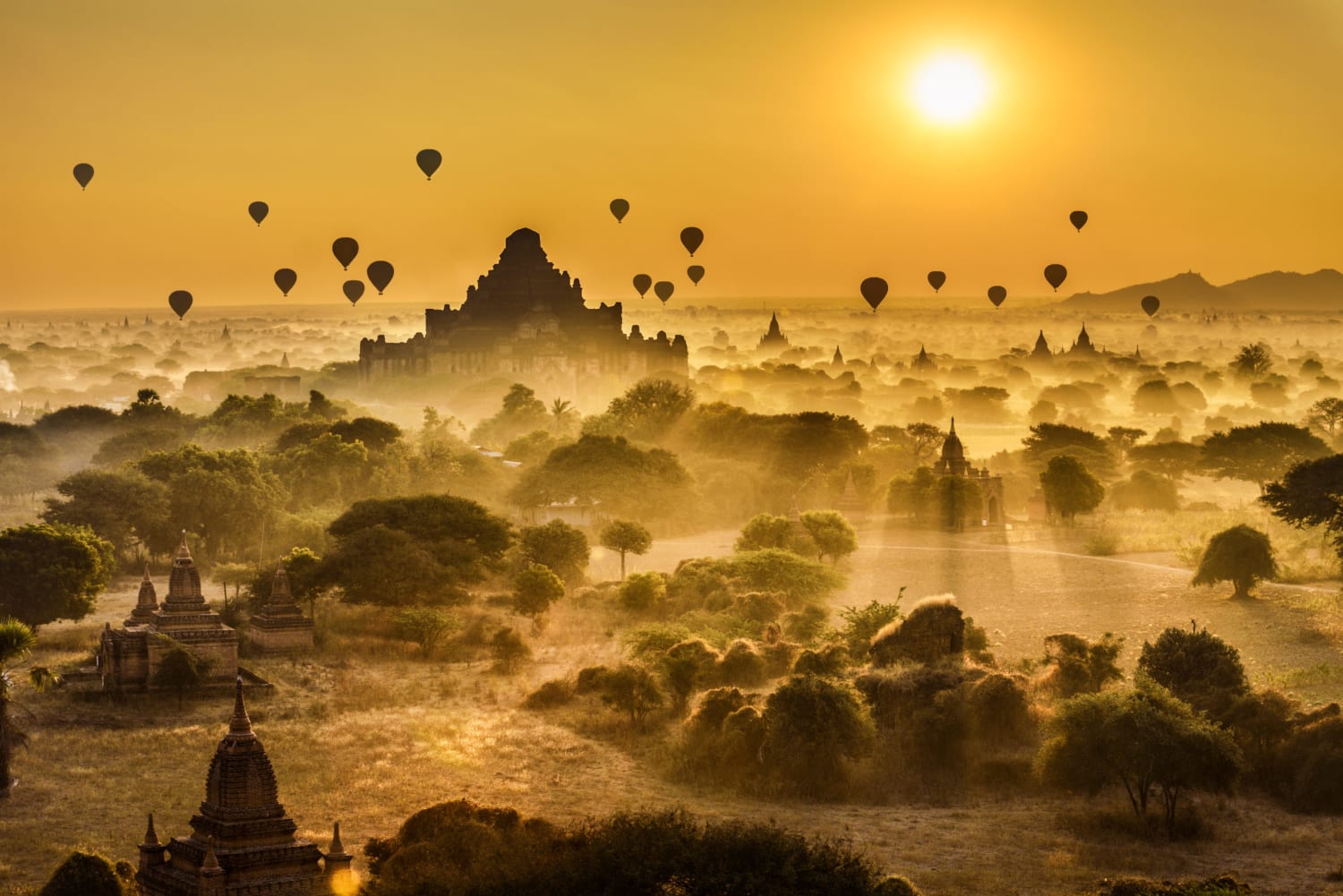 Burmese balloons at dawn