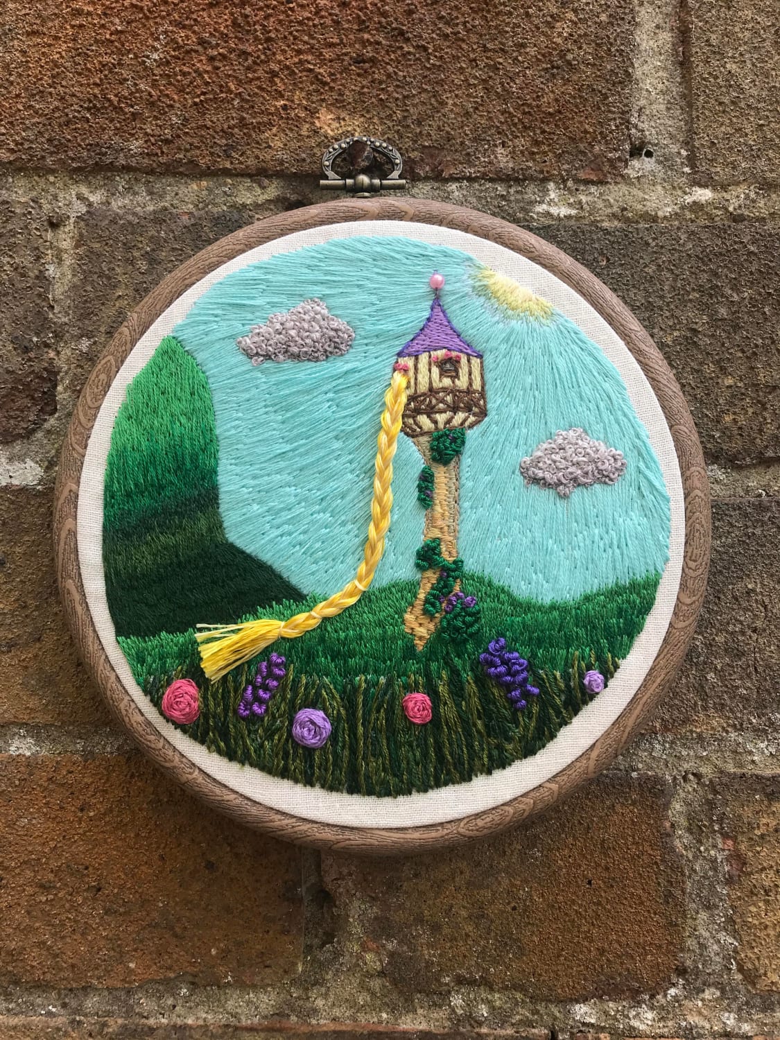 Just finished this Rapunzel/Tangled inspired embroidery, one of my own designs. It’s taken months so I’m feeling proud even though it isn’t perfect!