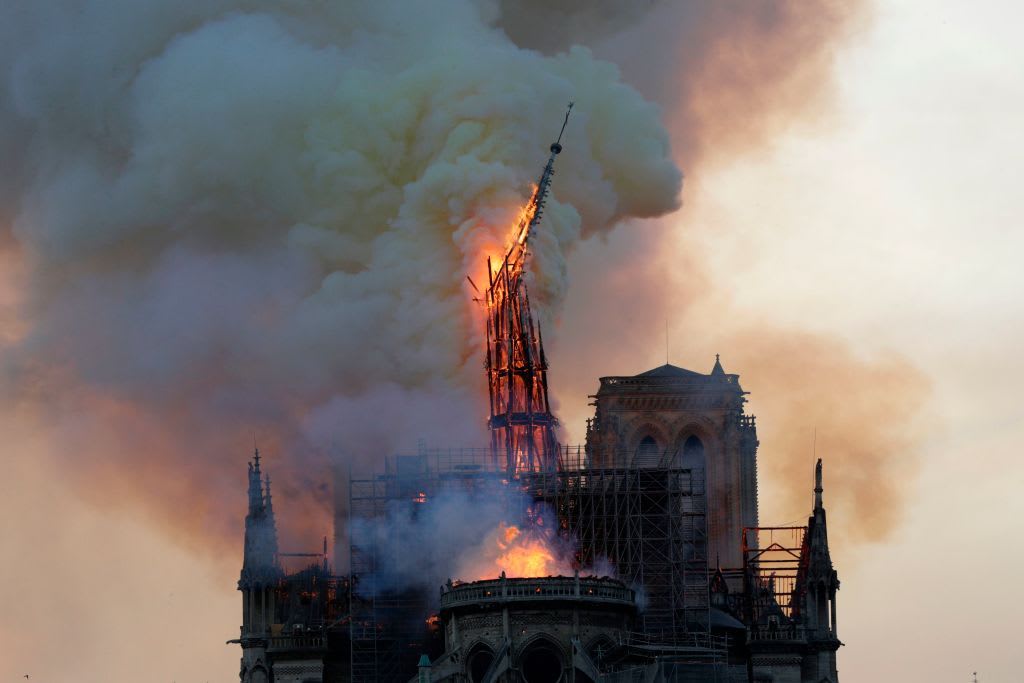France will rebuild Notre Dame's spire as it was, scrapping plans to top the fire-ravaged cathedral with a contemporary design: