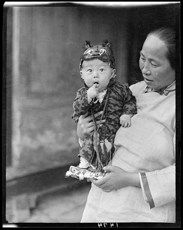 Happy Chinese New Year! It may not be the year of the tiger, but don't tell this cutie- he's all dressed up and ready to celebrate! Circa 1917-19, Beijing. Via Duke University Digital Library.