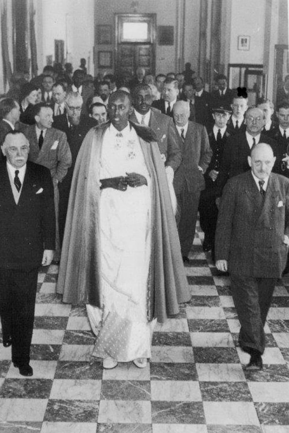 Mwami (King) Mutara III Rudahigwa of Rwanda on a state visit to Belgium, 1949. The King - reign 1931 to 1959 - was the first Roman Catholic convert in the history of the monarchy; his father before him had refused under foreign pressure and been deposed.