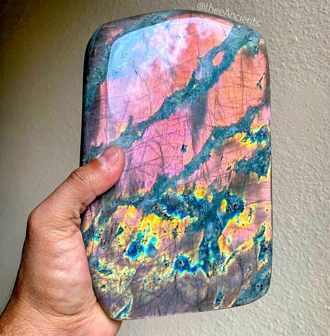 A beautiful slab of vapor wave looking Labradorite from the tundra of Labrador, Canada! looks like colorful spray paint Graffiti in Gemstone form!