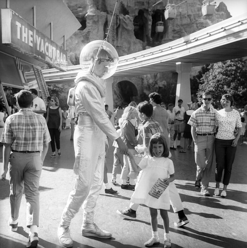 Shaking hands with the tomorrowland spaceman, Disneyland, California, 1966