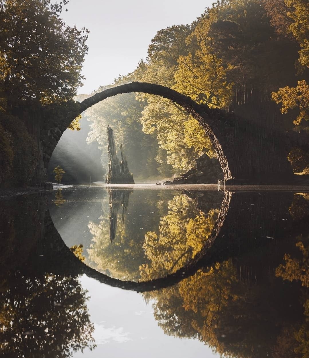 Rakotzbrukcke bridge and it's reflection.