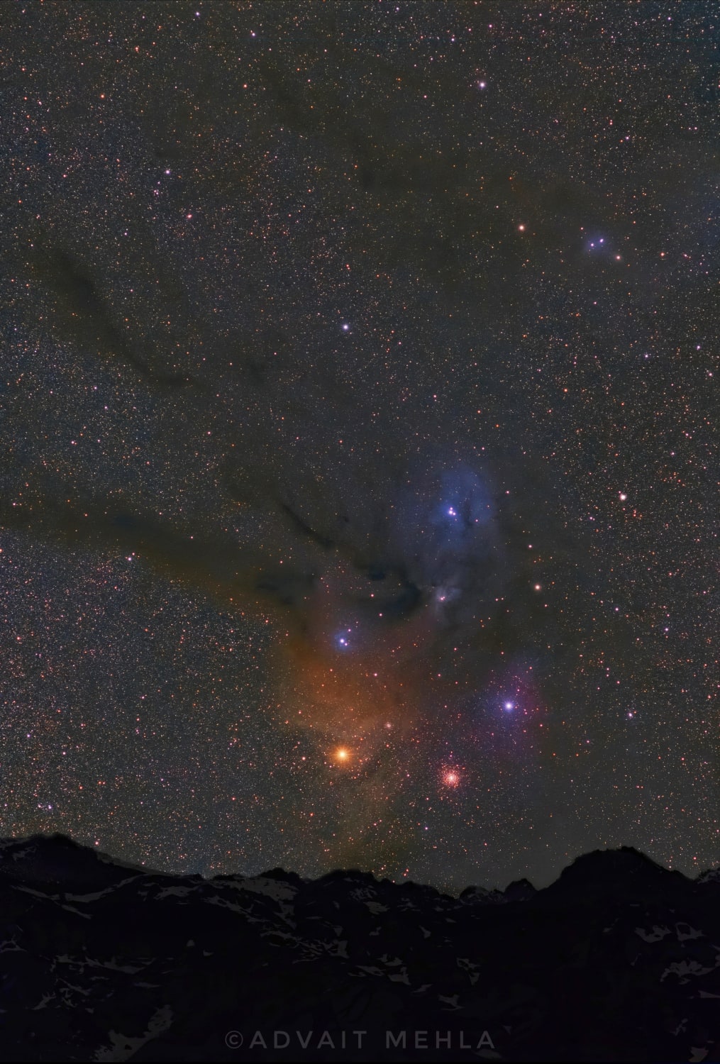 People are usually unaware of how huge objects in the night sky are. Here is an image of the clouds of Rho Ophiuchi setting against the Himalayas.