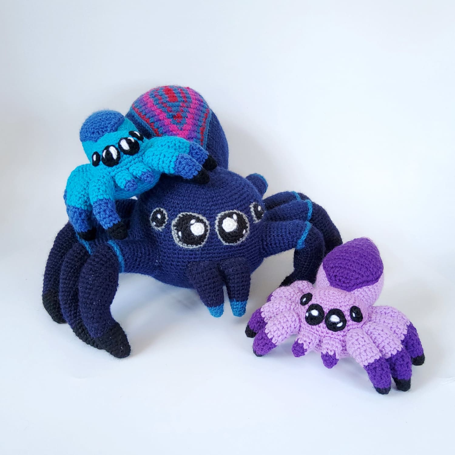 Hi! I'm new to Reddit and still figuring out how things work, but here are some of my crochet spiders.
