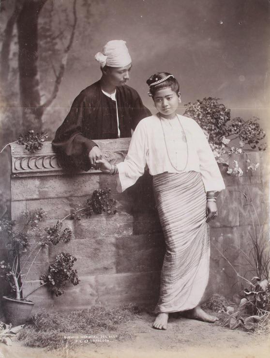 Studio portrait of a young Burmese couple. 1906. Yangon, Burma.