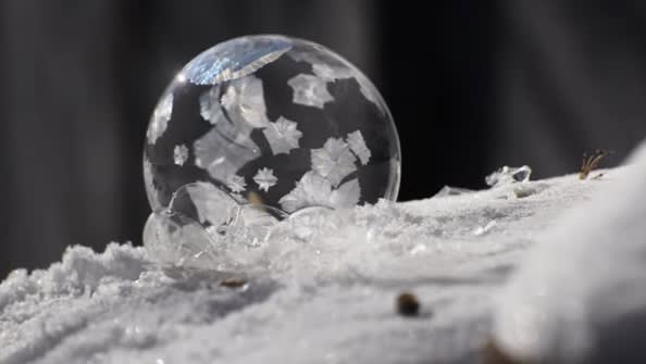 A photographer captured mesmerizing footage of a soap bubble freezing over and transforming into a delicate snow globe after temperatures plunged in Winnipeg, Canada. Because I need a little beauty today.