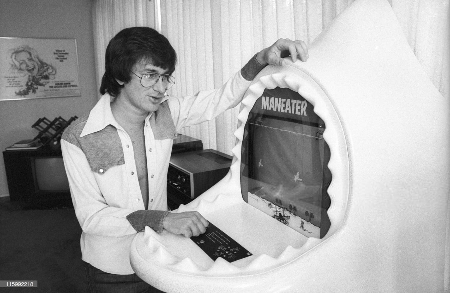 Steven Spielberg with the video game Maneater, 1975