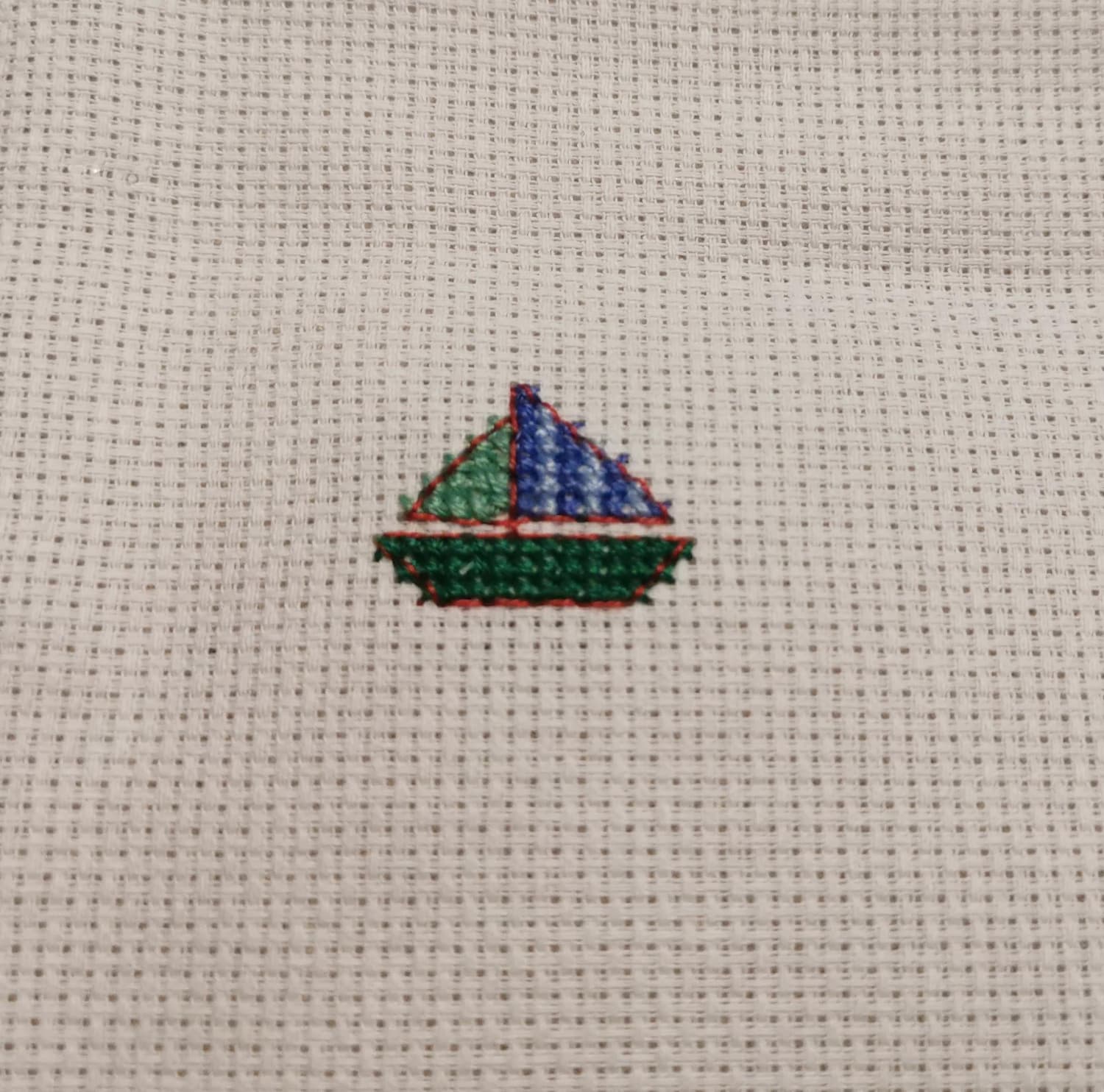 [FO] My 6-year-old son's first fo, I helped with the backstitching and guiding his needle when coming up from the back to the front. Pattern by Maria Diaz