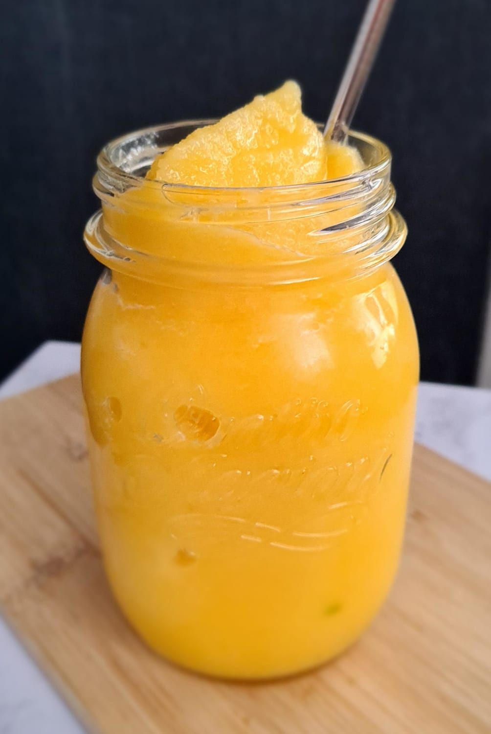 Frozen pineapple and mango smoothie.