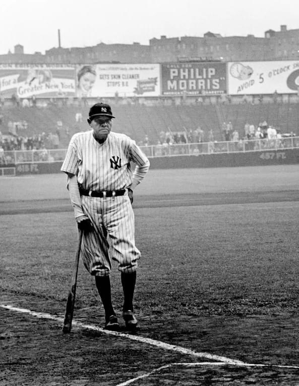 Babe Ruth’s last appearance at the Yankee Stadium, New York City, 1948. He died of cancer two months later. (Ironic advertisement placement)