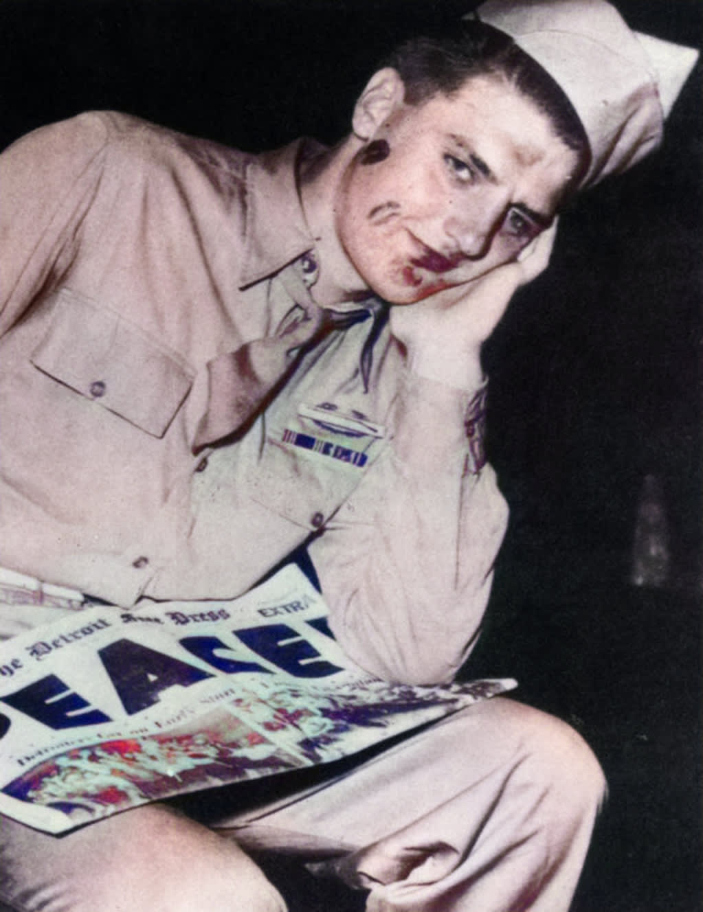 An American soldier with lipstick on his face in Detroit, Michigan during Victory Over Japan Day (V-J Day) celebrations 75 years ago today on August 14, 1945