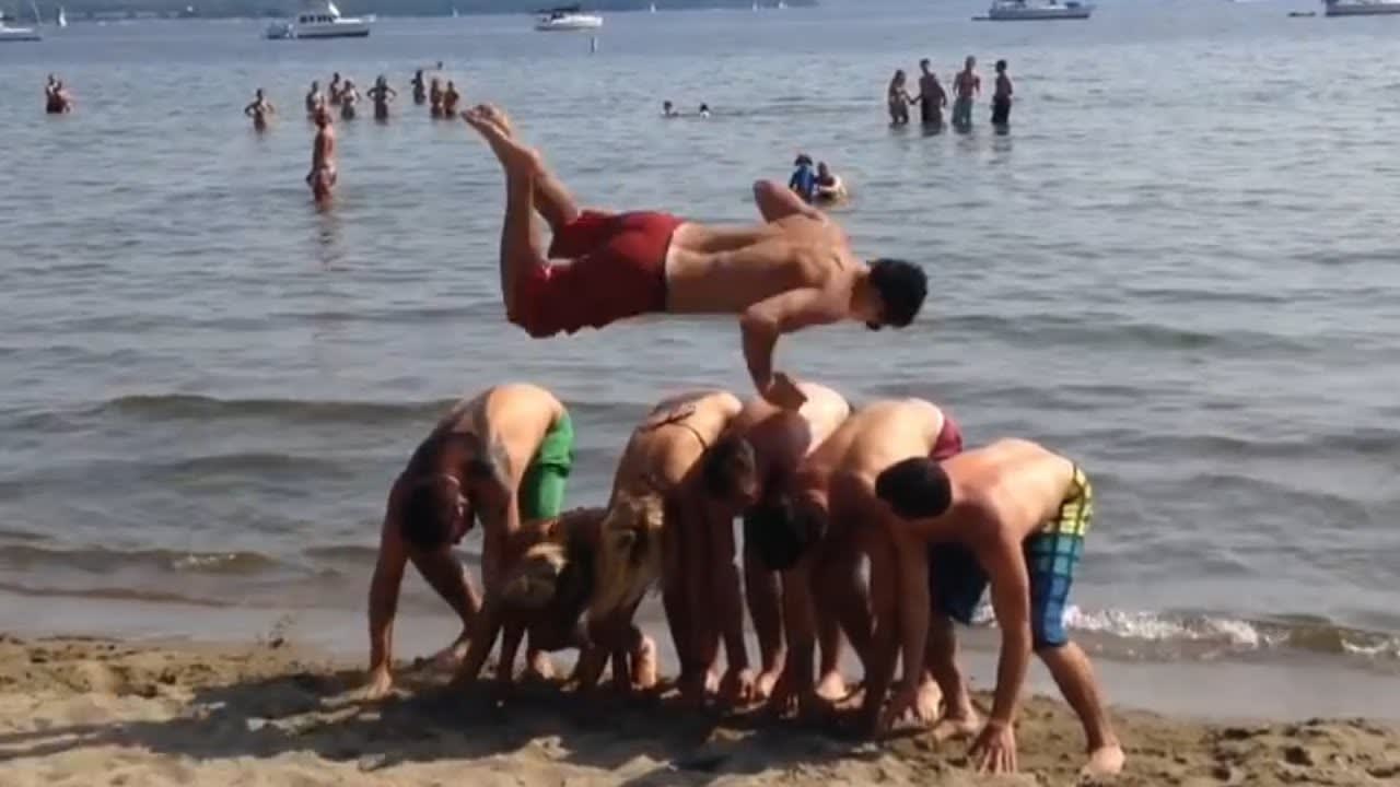 Man Frontflips Over 6 People At The Beach | People Are Awesome
