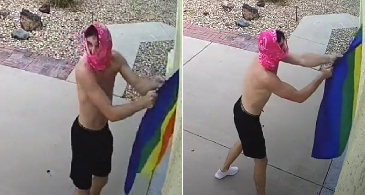 Homophobe goes viral after repeatedly trying - and failing - to tear down a Pride flag from someone's house: