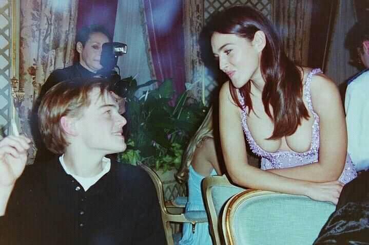 Young Leonardo DiCaprio with Monica Bellucci. 1995