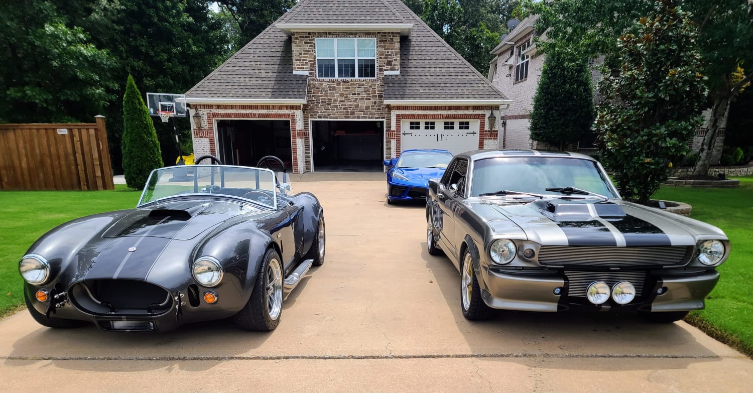 2015 Factory Five Mark IV Roadster and a 1966 Mustang Coupe.