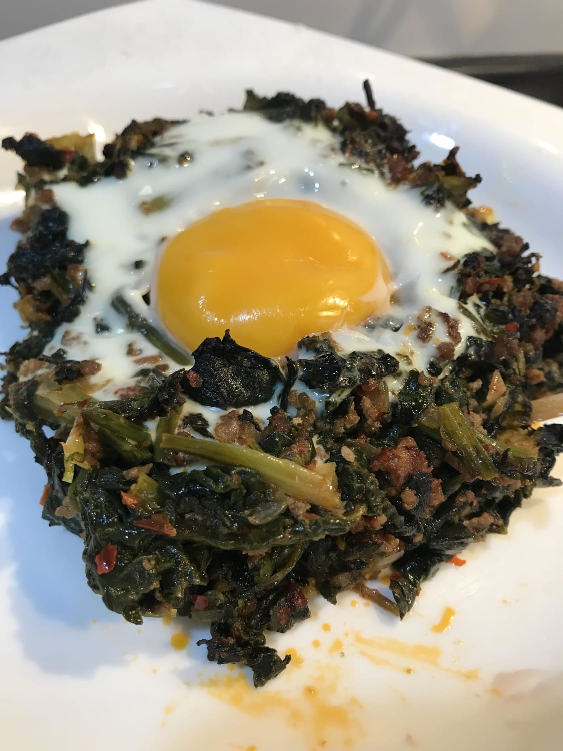 Baked spinach with ground beef and egg