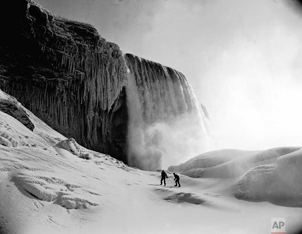 A wall of ice is seen on part of Niagara Falls in New York, OTD in 1951. Although it appears frozen, the water never actually stops flowing underneath.