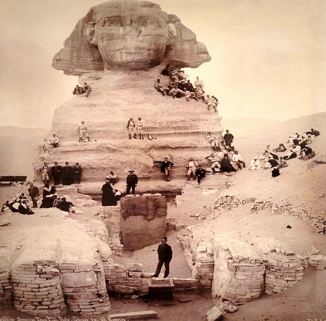 Baseball players pose for a picture on the Sphinx, 1889
