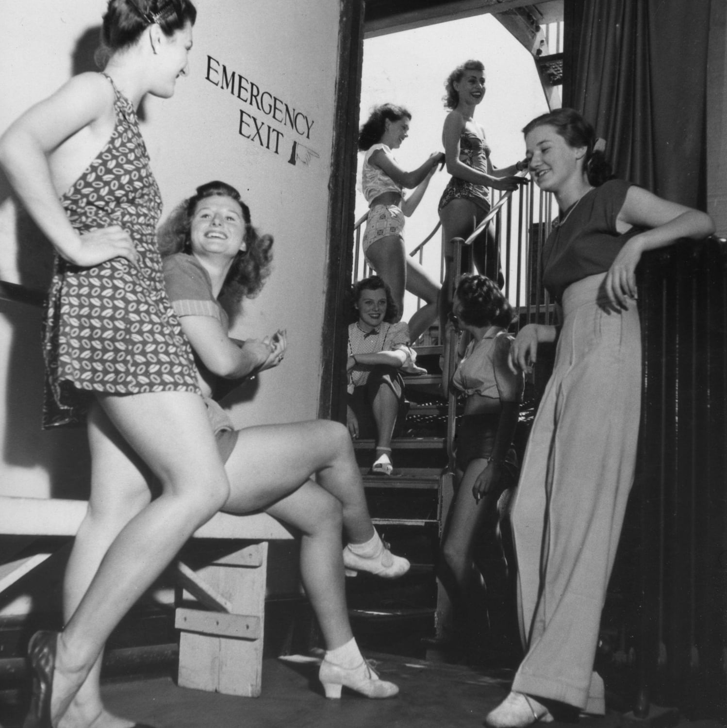 Young women backstage at the Windmill Theatre, the oldest strip club in London. England, 1950.