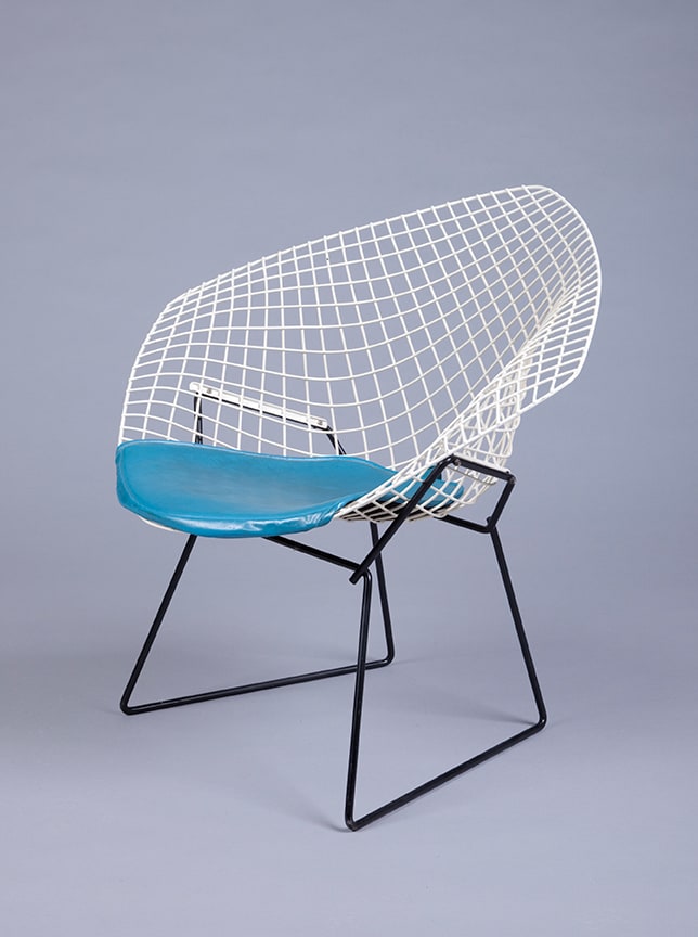 Harry Bertoia designed his Diamond Chair in 1953, at the zenith of the Mid-Century Modern movement. The wire grid was easily manipulated and led not only to the chair’s airy design but allowed for mass manufacture. Learn more
