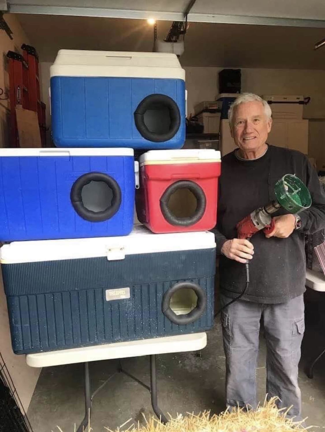 This man is recycling old picnic coolers into shelters for stray cats for winter! How very cool is this?!