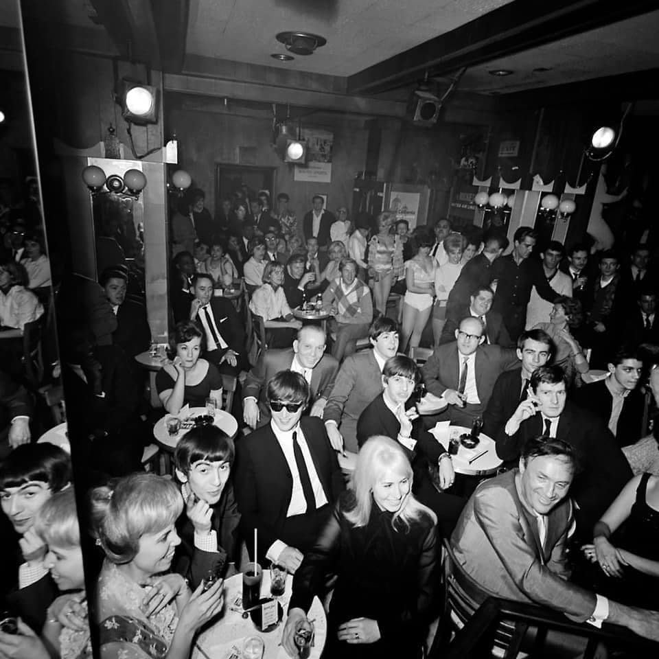 The Beatles enjoying a night on the town at the trendy Peppermint Lounge, 128 W.45th Street in Manhattan, 1964