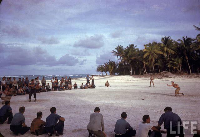 US servicemen enjoy a game of baseball on Tarawa Atoll, 1943. (Original color photo)