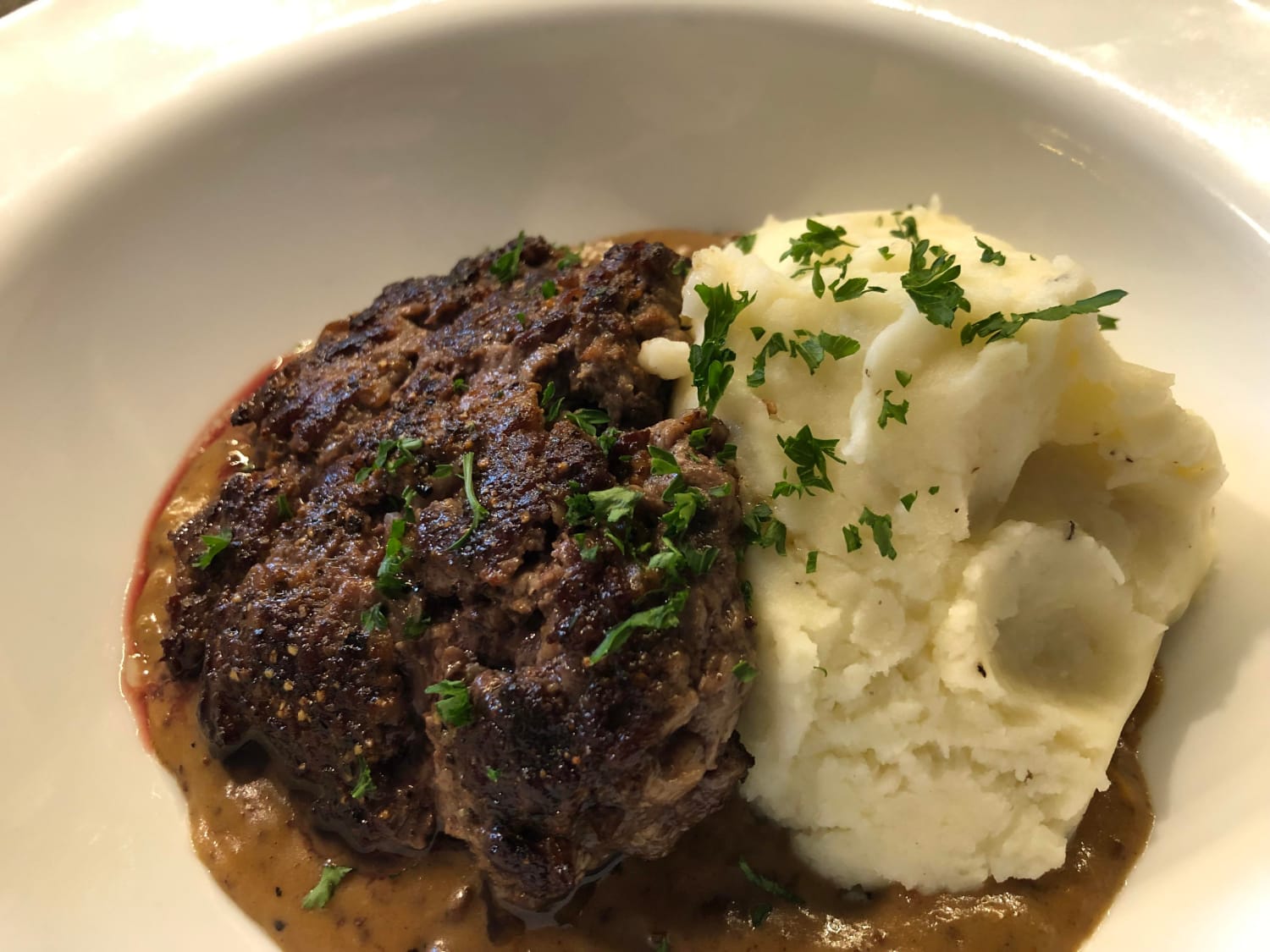 My wife requested Salisbury steak, mashed potatoes and gravy for dinner. So I made her a ground rib eye / short rib Salisbury steak with garlic mash and chunky beef gravy. Happy Mother’s Day, Moms!