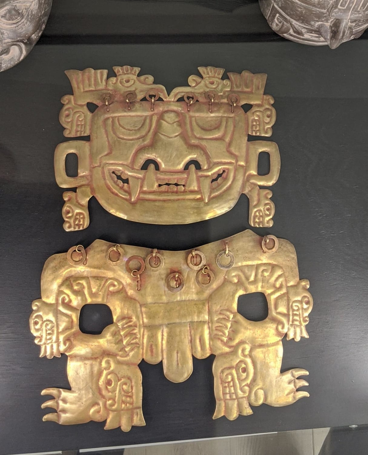 God of the underworld - native gold, chasing, cinnabar coloring. Mexico, 1500-1200 BC.