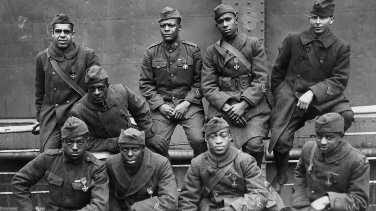 WW1: Nine soldiers of the 369th Infantry Regiment, known as the Harlem Hellfighters, (Feb 12, 1919) Photographer remains a mystery