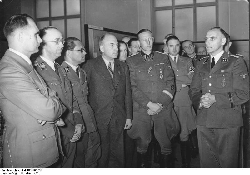 Rudolf Hess, Heinrich Himmler, Philipp Bouhler, Fritz Todt, Reinhard Heydrich and Erich Ehrlinger meeting in Berlin, Germany to discuss plans to settle Eastern Europe, 20 Mar 1941. Source: German Federal Archives
