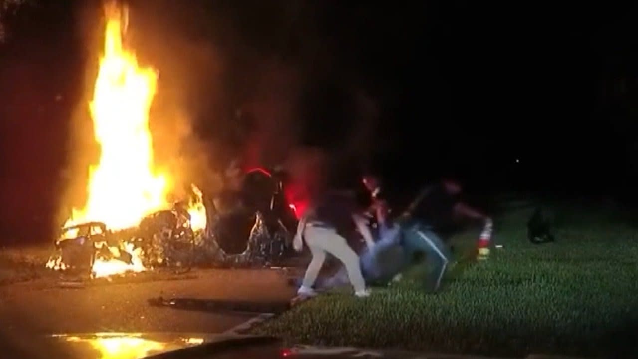 Police Pull Man From Burning Car in Heart-Stopping Moment