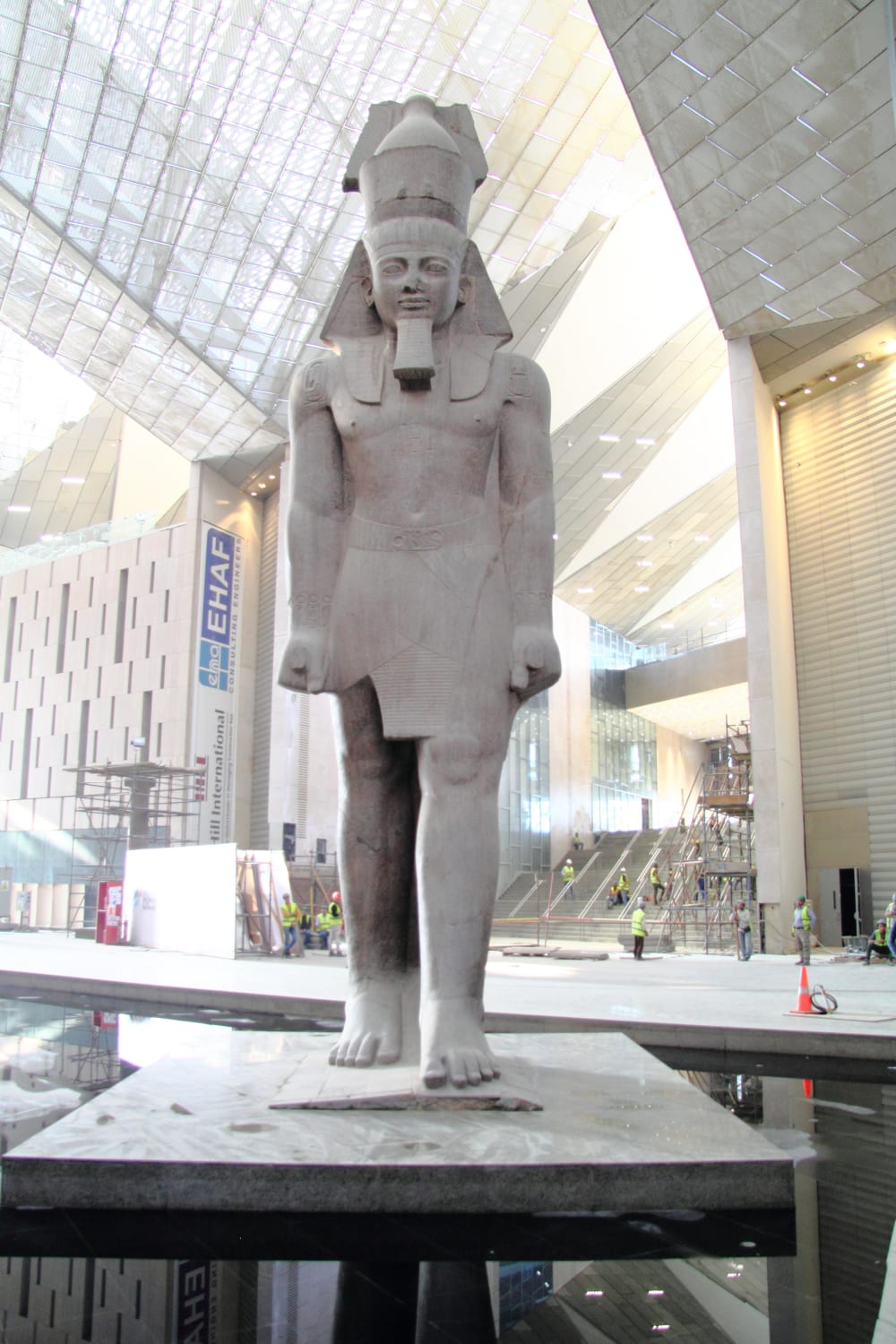A 3,200-year-old statue of Ramesses II discovered in 1820 by Giovanni Battista Caviglia at the Great Temple of Ptah near Memphis, Egypt. Made from red granite, the statue is 11 meters tall and weighs 83 tons. Now located in the entrance hall of the Grand Egyptian Museum